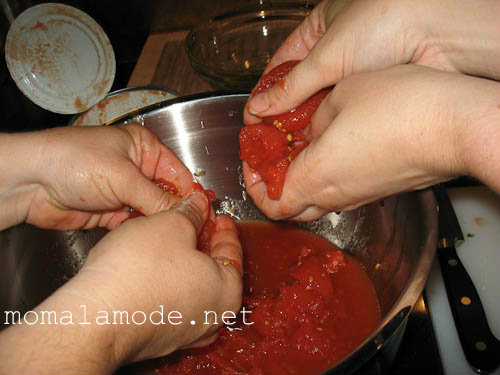 crushing the tomatoes by hand gives them a better consistency