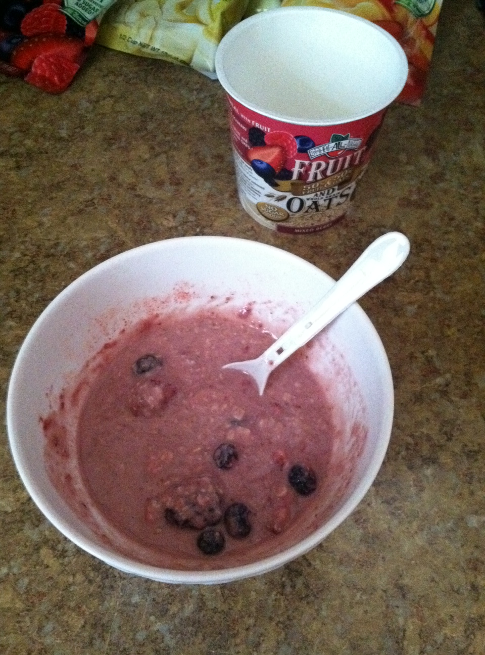 I used the entire fruit packet which included a fruit "powder" which made my oatmeal pink