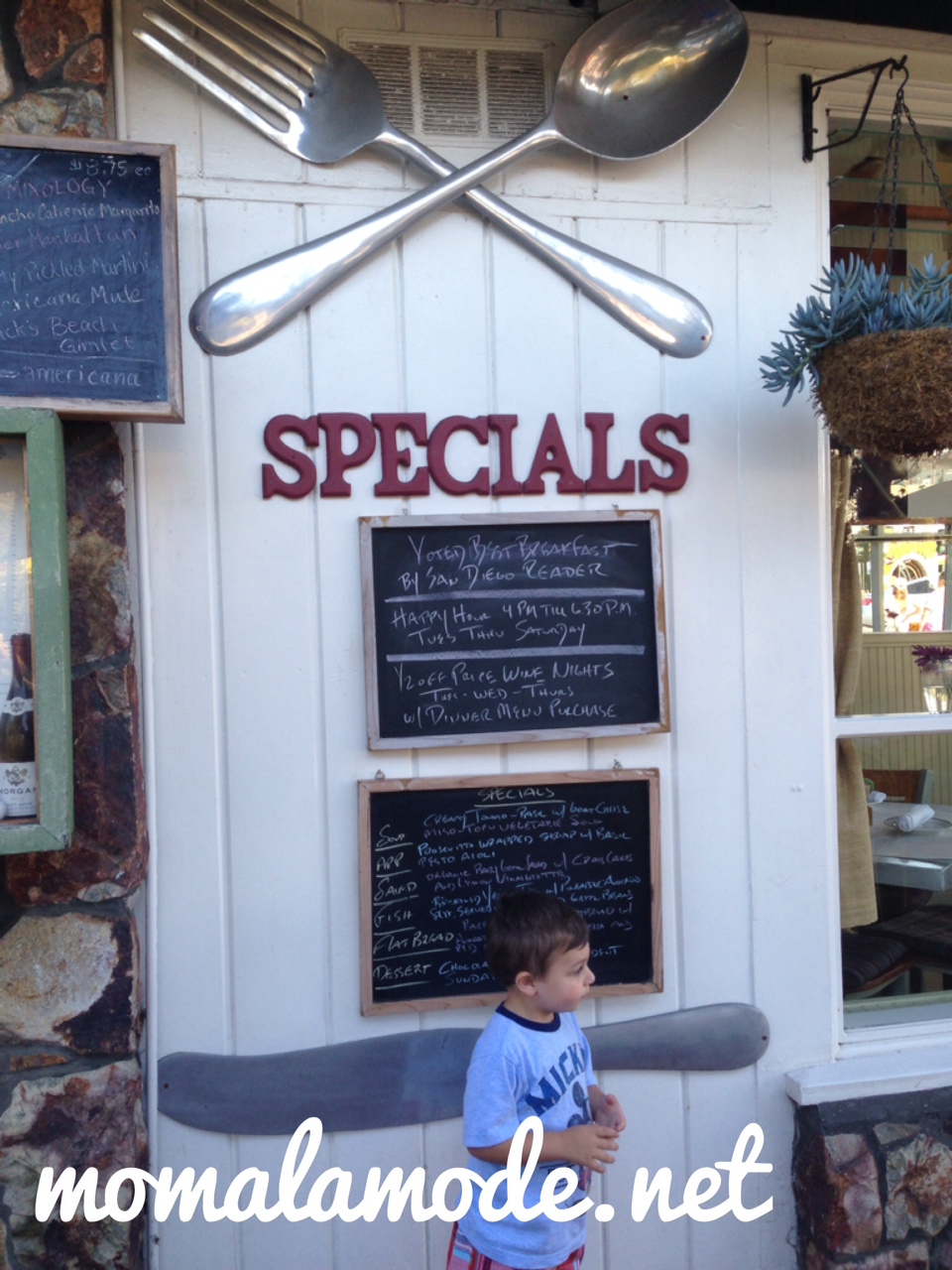 Roc checking out the specials outside of Americana in Del Mar, CA